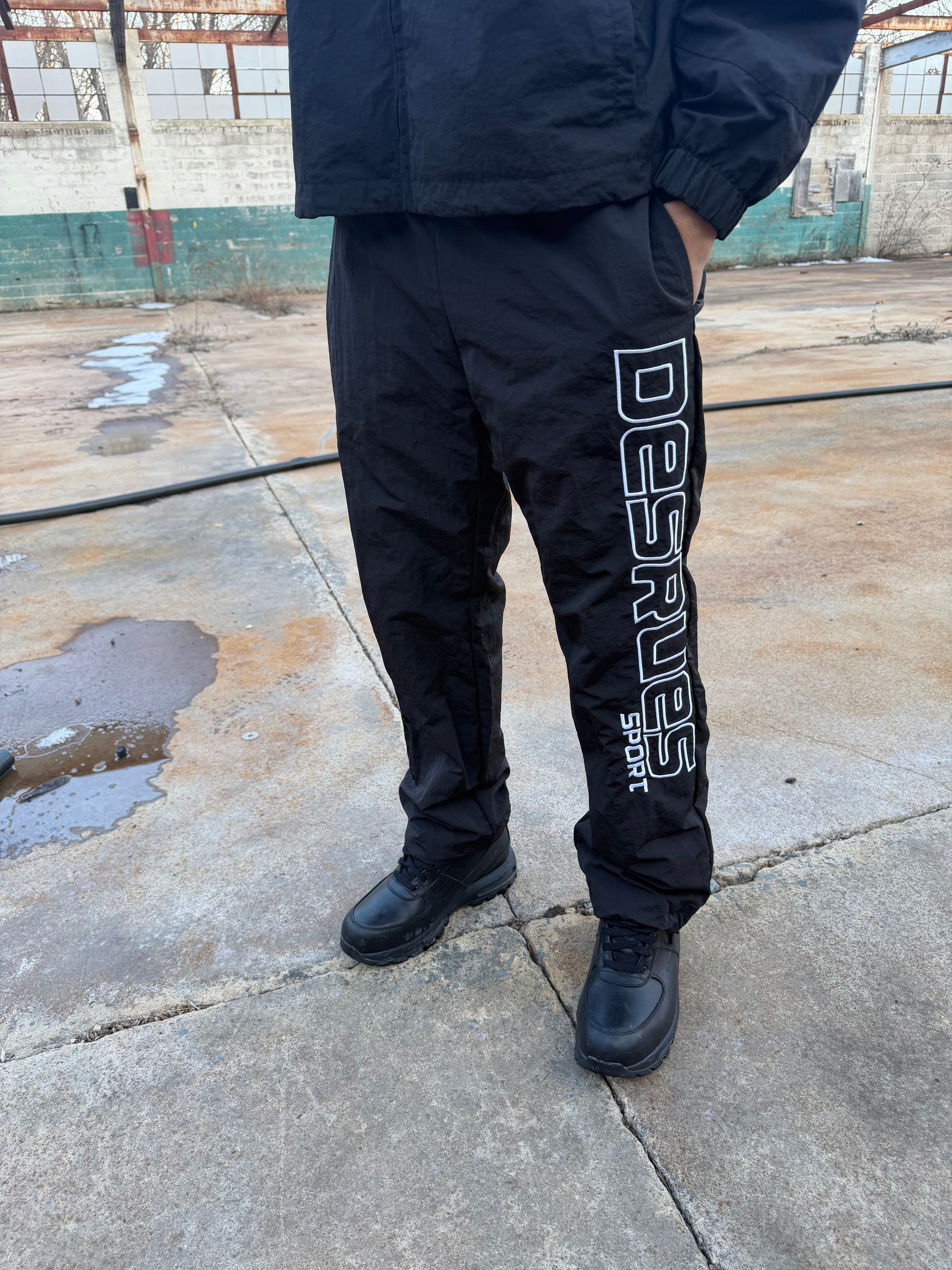 BLACK WINDBREAKER PANTS